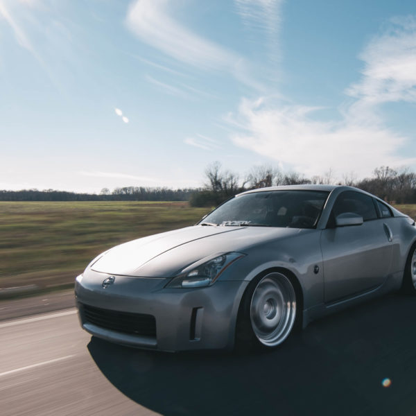 car driving on a sunny road