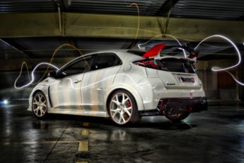 Honda Civic type r fk2 white edition parked in an indoor setting
