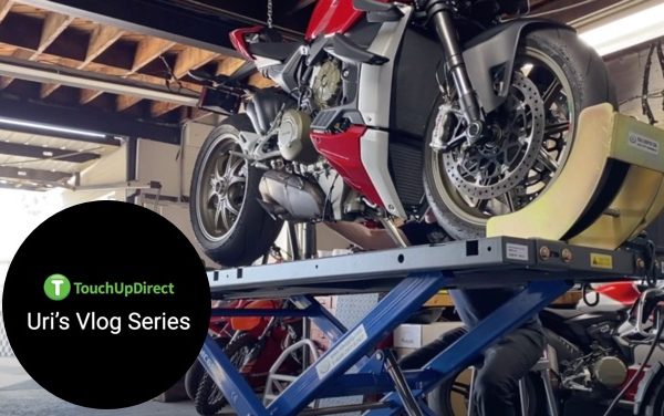 A snippet Ducati Streetfighter V4 elavated for upgrade in a motor shop intended for Uri's Vlog Series
