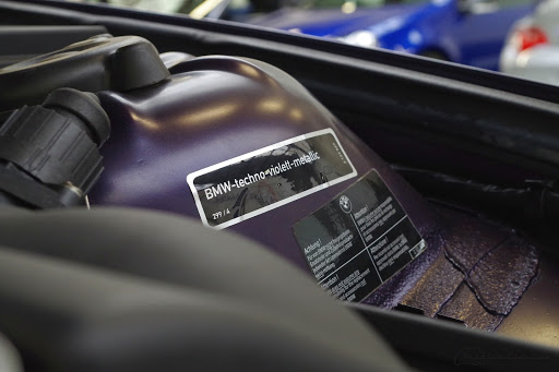 Violet touch up paint applied in BMW