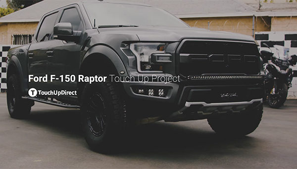 A photo of black Ford-F Raptor parked in an outdoor setting