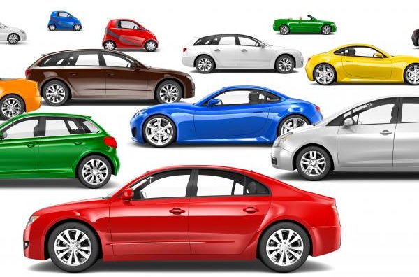 A lineup of automobiles in various eye-catching colors, showcasing a vibrant and diverse range of shades