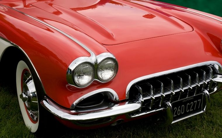 A close-up of a red corvette