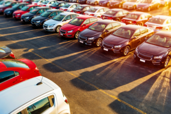 Cars in a parking lot during summer