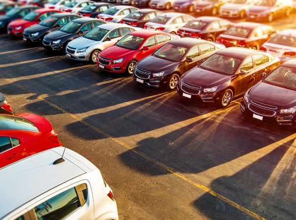 Cars in a parking lot during summer