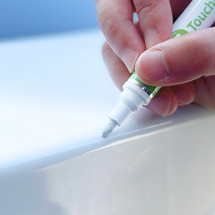 The TouchUpDirect Touch Up Pen touches up a blemish.