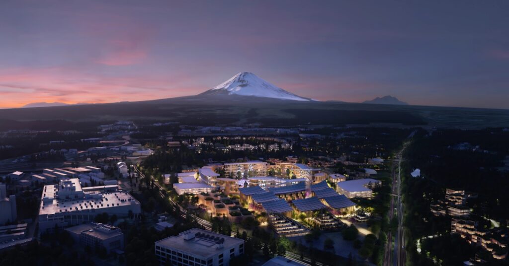 A mockup of Toyota's Woven City with Mount Fuji in the background.