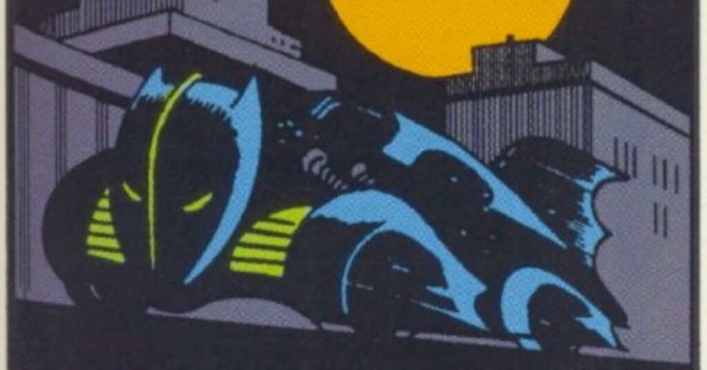 A comic book panel of the Batmobile in its first appearance in 1941. Features include a giant tail fin and bat face.
