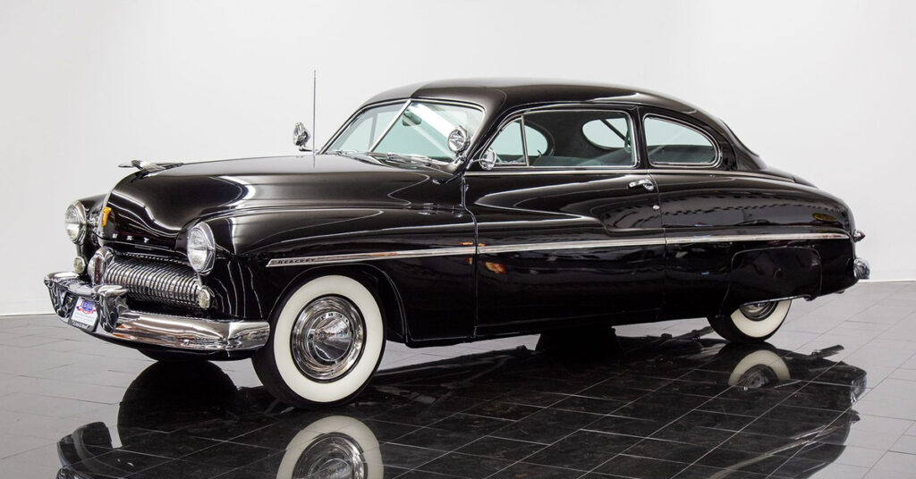 A black 1949 Mercury Eight Deluxe.