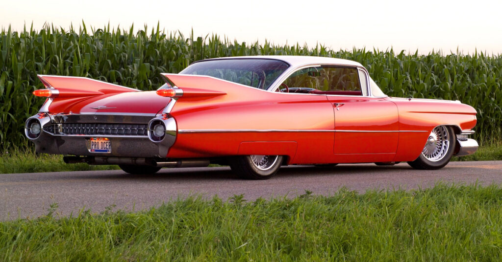 A red 1959 Cadillac Eldorado with a white retractable hood.
